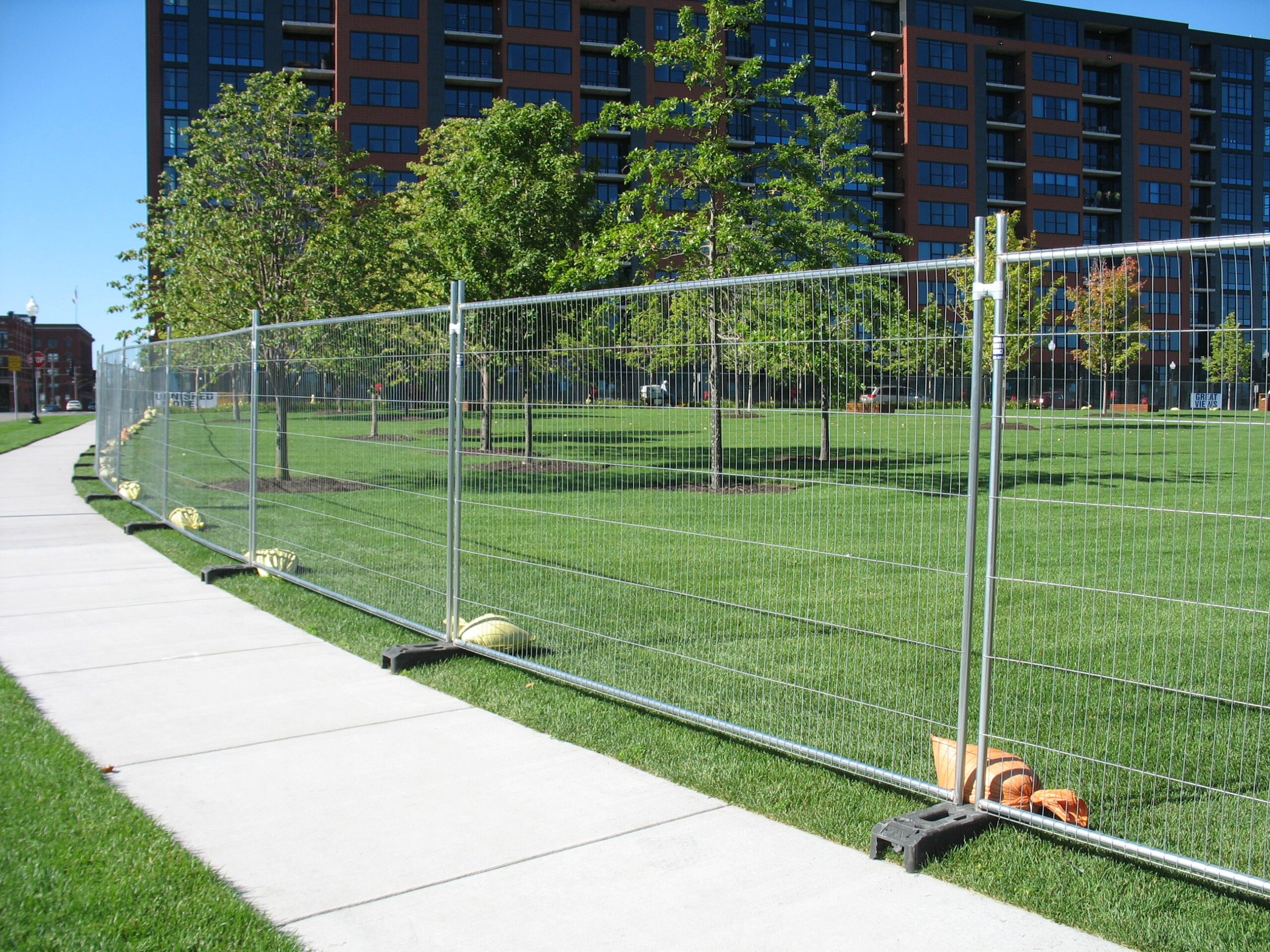 Professional portable fencing installation for construction sites and events - Rapid Rentals LLC